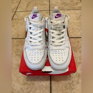 Nike Kids white with gold and purple accents. - Size: 5Y